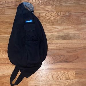 Kavu one strap backpack! perfect for traveling and has tons of pockets!